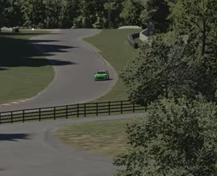 GR86 Cornering at Summit Point - Green GR86 powering through the right-hander